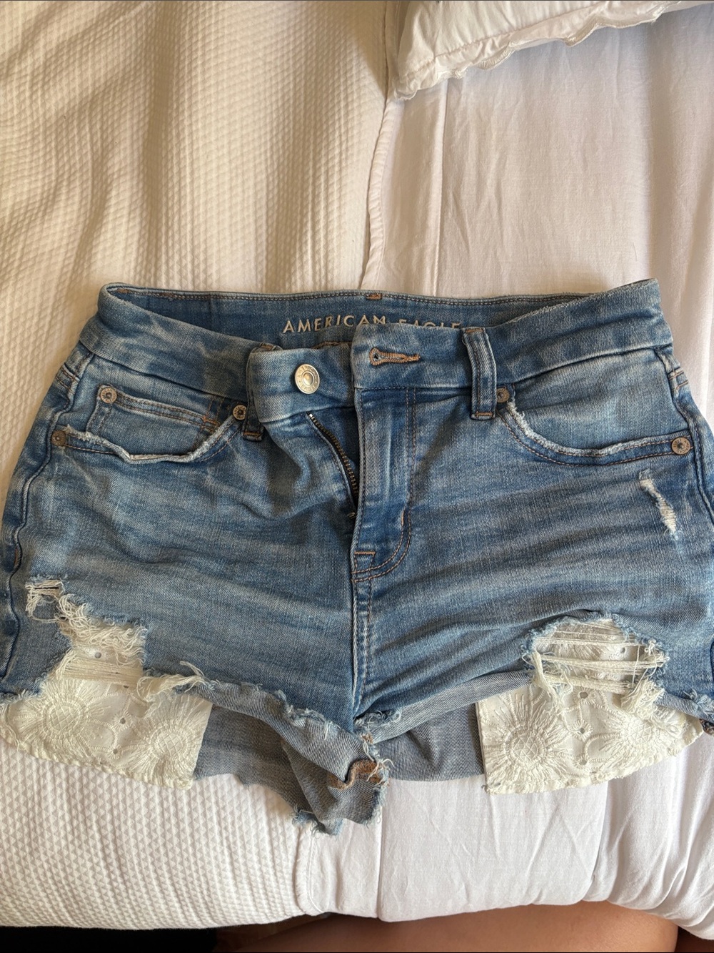 American Eagle Outfitters Light Blue Distressed Denim Shorts with Lace Insets